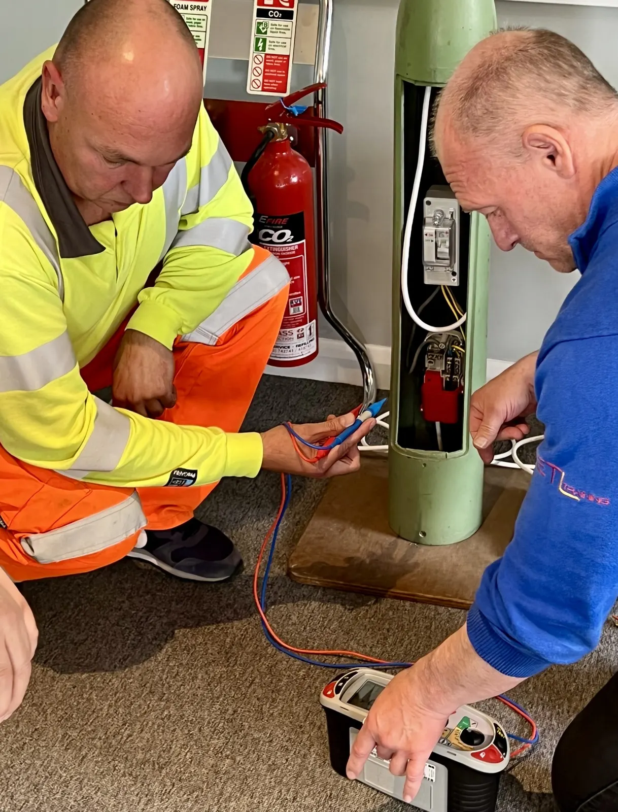 Apprentice training on a lighting column